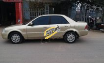 Ford Laser Delu 2001 - Cần bán xe Ford Laser Delu năm 2001, màu vàng Ford Laser Delu 2001 - Cần bán xe Ford Laser Delu năm 2001, màu vàng