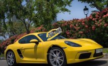 Cần bán lại xe Porsche Cayman 718 2017, màu vàng, nhập khẩu nguyên chiếc như mới Cần bán lại xe Porsche Cayman 718 2017, màu vàng, nhập khẩu nguyên chiếc như mới
