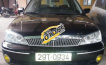 Chính chủ cần bán xe Ford Laser GHIA 1.8 sản xuất năm 2003, màu đen, giá cạnh tranh Chính chủ cần bán xe Ford Laser GHIA 1.8 sản xuất năm 2003, màu đen, giá cạnh tranh