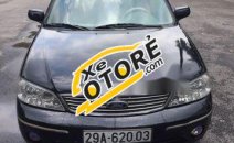 Cần bán Ford Laser 1.8AT 2004, màu đen Cần bán Ford Laser 1.8AT 2004, màu đen
