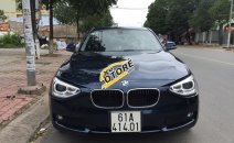 Cần bán BMW 1 Series 116i sản xuất 2014, màu xanh lam, xe nhập Cần bán BMW 1 Series 116i sản xuất 2014, màu xanh lam, xe nhập