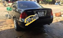 Cần bán gấp Ford Laser 1.8AT năm sản xuất 2003, màu đen chính chủ Cần bán gấp Ford Laser 1.8AT năm sản xuất 2003, màu đen chính chủ