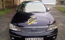 Bán Ford Laser GHIA 2004, màu đen chính chủ, giá 242tr Bán Ford Laser GHIA 2004, màu đen chính chủ, giá 242tr
