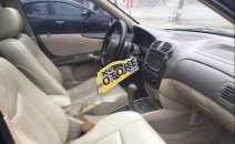 Bán Ford Laser 1.8AT đời 2004, màu đen, chính chủ, giá 206tr Bán Ford Laser 1.8AT đời 2004, màu đen, chính chủ, giá 206tr