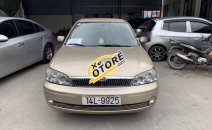 Cần bán gấp Ford Laser 1.8 MT sản xuất 2003, màu vàng Cần bán gấp Ford Laser 1.8 MT sản xuất 2003, màu vàng