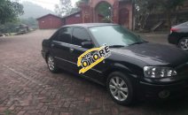Bán Ford Laser Ghia đời 2003, màu đen, xe nhập, 165 triệu Bán Ford Laser Ghia đời 2003, màu đen, xe nhập, 165 triệu