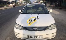 Cần bán lại xe Ford Laser 1.8 AT đời 2004, màu trắng, máy 1.8 rất tiết kiệm xăng Cần bán lại xe Ford Laser 1.8 AT đời 2004, màu trắng, máy 1.8 rất tiết kiệm xăng