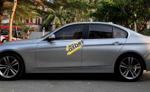 Bán BMW 320i Sportline 2014 màu bạc chính chủ Bán BMW 320i Sportline 2014 màu bạc chính chủ