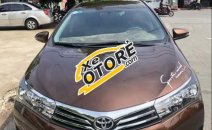 Toyota Corolla altis AT 2015 - Cần bán lại xe Toyota Corolla altis AT sản xuất 2015, màu nâu chính chủ