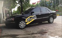 Bán Ford Laser 1.8MT 2003, màu đen, xe còn mới Bán Ford Laser 1.8MT 2003, màu đen, xe còn mới