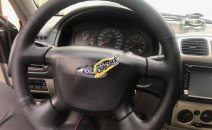 Cần bán xe Ford Laser 1.8 năm sản xuất 2002, màu xám Cần bán xe Ford Laser 1.8 năm sản xuất 2002, màu xám