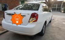 Bán xe Daewoo Lacetti EX năm 2005, màu trắng. Xe như mới Bán xe Daewoo Lacetti EX năm 2005, màu trắng. Xe như mới