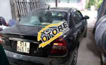 Bán Chevrolet Nubira 1.6 MT đời 2002, màu đen, số sàn Bán Chevrolet Nubira 1.6 MT đời 2002, màu đen, số sàn
