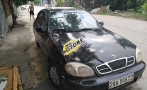 Cần bán lại xe Daewoo Lanos MT sản xuất 2001, màu đen Cần bán lại xe Daewoo Lanos MT sản xuất 2001, màu đen