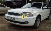 Bán Ford Laser đời 2002, màu trắng, giá cạnh tranh Bán Ford Laser đời 2002, màu trắng, giá cạnh tranh
