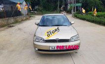 Bán Ford Laser 1.8 sản xuất 2002, màu vàng, giá 145tr Bán Ford Laser 1.8 sản xuất 2002, màu vàng, giá 145tr