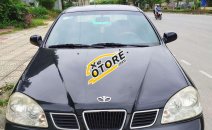 Nhà bán Daewoo Lacetti EX đời 2005, màu đen số sàn Nhà bán Daewoo Lacetti EX đời 2005, màu đen số sàn