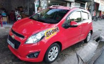 Cần bán xe Chevrolet Spark AT sản xuất năm 2014, màu đỏ Cần bán xe Chevrolet Spark AT sản xuất năm 2014, màu đỏ