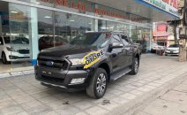 Cần bán lại xe Ford Ranger Wildtrak 3.2L 4x4AT sản xuất 2016, màu đen, nhập khẩu nguyên chiếc Cần bán lại xe Ford Ranger Wildtrak 3.2L 4x4AT sản xuất 2016, màu đen, nhập khẩu nguyên chiếc