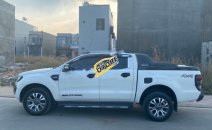 Cần bán lại xe Ford Ranger Wildtrak 3.2L 4x4 AT đời 2015, màu trắng, nhập khẩu nguyên chiếc Cần bán lại xe Ford Ranger Wildtrak 3.2L 4x4 AT đời 2015, màu trắng, nhập khẩu nguyên chiếc