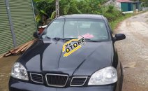 Cần bán gấp Daewoo Lacetti sản xuất 2005, màu đen, 138tr Cần bán gấp Daewoo Lacetti sản xuất 2005, màu đen, 138tr