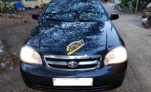 Cần bán lại xe Daewoo Lacetti EX sản xuất 2011, màu đen Cần bán lại xe Daewoo Lacetti EX sản xuất 2011, màu đen