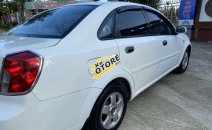 Cần bán xe Daewoo Lacetti sản xuất năm 2004, màu trắng, xe nhập Cần bán xe Daewoo Lacetti sản xuất năm 2004, màu trắng, xe nhập