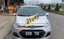 Cần bán lại xe Hyundai Grand i10 1.2 AT sản xuất 2014, màu bạc Cần bán lại xe Hyundai Grand i10 1.2 AT sản xuất 2014, màu bạc