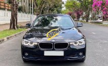 BMW 3 Series 2016 - Cần bán BMW 3 Series 320i sản xuất năm 2016, màu đen