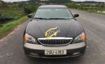 Cần bán xe Daewoo Magnus đời 2004, màu đen giá cạnh tranh Cần bán xe Daewoo Magnus đời 2004, màu đen giá cạnh tranh