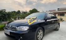 Cần bán gấp Kia Spectra đời 2003, màu đen, giá chỉ 99 triệu Cần bán gấp Kia Spectra đời 2003, màu đen, giá chỉ 99 triệu