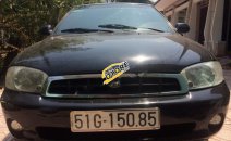 Cần bán Kia Spectra 1.6 MT đời 2004, màu đen, số sàn Cần bán Kia Spectra 1.6 MT đời 2004, màu đen, số sàn