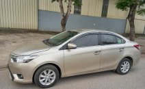Bán ô tô Toyota Vios E 2015, màu nâu vàng Bán ô tô Toyota Vios E 2015, màu nâu vàng