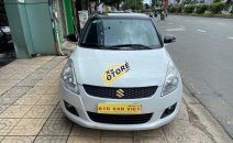 Cần bán xe Suzuki Swift đời 2016, màu trắng Cần bán xe Suzuki Swift đời 2016, màu trắng
