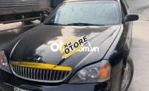 Daewoo Magnus AT 2004 - Bán xe Daewoo Magnus AT đời 2004, màu đen, nhập khẩu