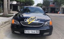 Daewoo Magnus AT 2004 - Cần bán xe Daewoo Magnus AT sản xuất năm 2004, màu đen, xe nhập