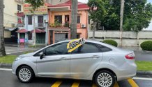 Cần bán xe Ford Fiesta 1.6 AT sản xuất năm 2012, màu bạc, 255tr Cần bán xe Ford Fiesta 1.6 AT sản xuất năm 2012, màu bạc, 255tr