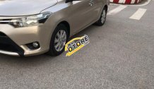 Cần bán Toyota Vios 1.5 E 2015, màu vàng Cần bán Toyota Vios 1.5 E 2015, màu vàng